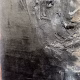 Rugged mixed media drawing of a head (signature)