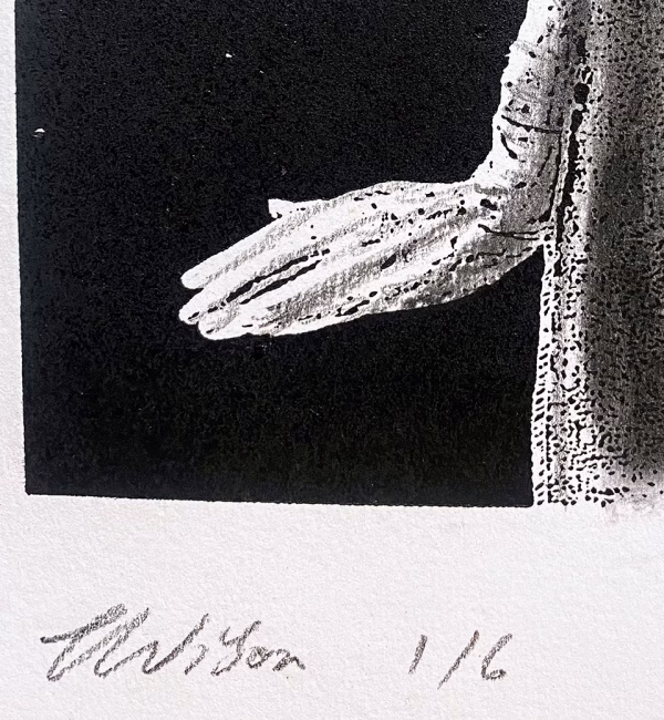 Detail: A woman crawls along the ground. She is bald, skeletal and covered in a removal blanket. Printed and tinted/shaded in black.