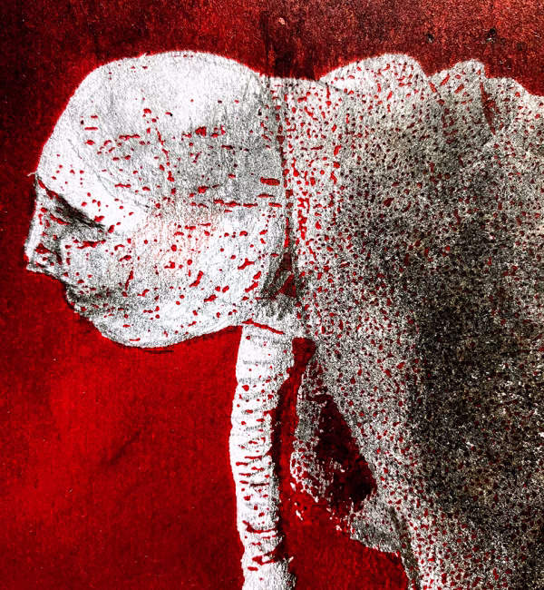 Detail: A woman crawls along the ground. She is bald, skeletal and covered in a removal blanket. Printed and tinted/shaded in red.